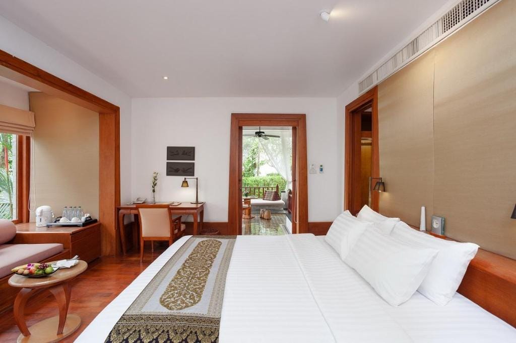 Villa roofs and palms at Nakamanda Resort on the Klong Muang hillside