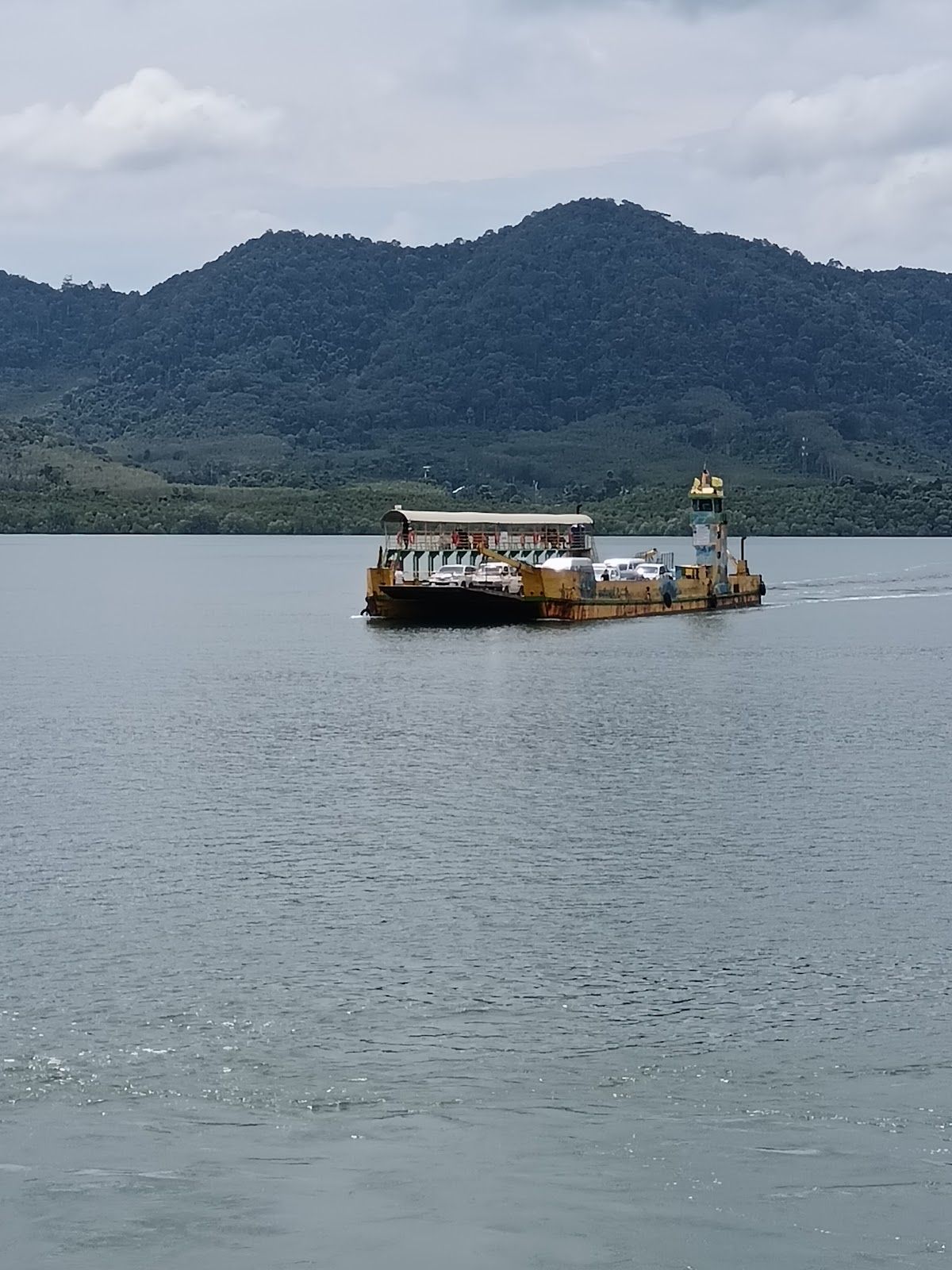 The vehicle car ferry crossing between the mainland and Koh Lanta Noi near Ban Hua Hin pier