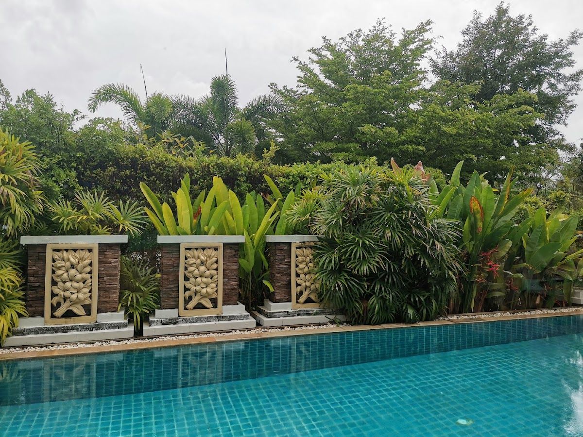 Private pool set in a lush tropical garden at Pimann Buri Pool Villas in Ao Nang, Krabi