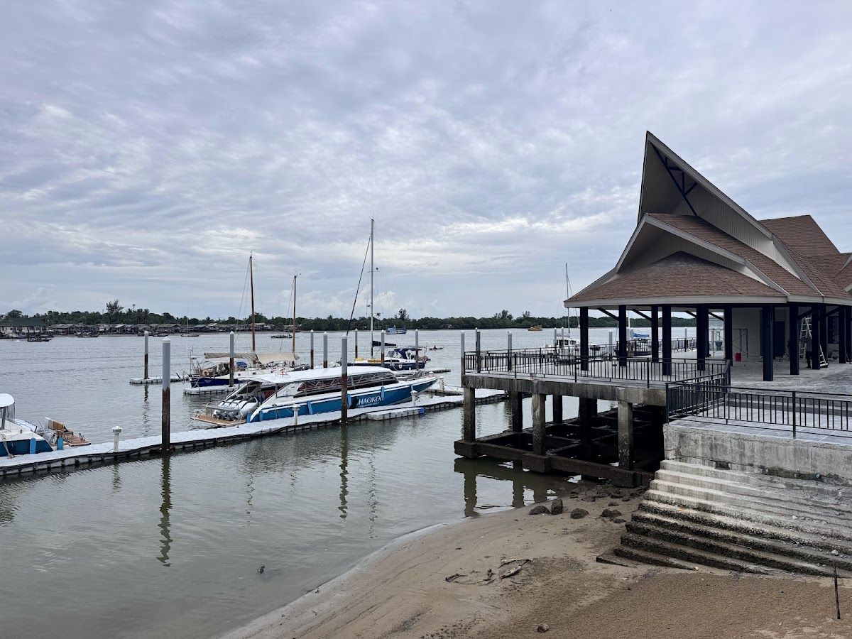 Speedboats and a covered pier terminal at Krabi River Marina in Krabi Town, the main departure point for island ferries